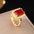 Elegant 18K gold plated open ring with a large emerald-cut red zircon and halo stones - Ruby Open Ring / Gold