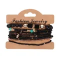 Detailed view of Bohemian 8-piece elastic seed bead bracelet set on jewelry card - Black