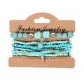 Detail view of 8-piece bohemian turquoise stretch beaded bracelet set on card - Blue