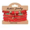 Dettaglio del set di 8 braccialetti elastici bohémien in perline rosse donna - Rosso