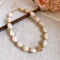 Close-up of retro acrylic necklace with marbled beads and gold-tone spacers. - 64# Necklace / Khaki