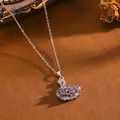 Elegante collana con ciondolo a cigno con pietre occhio di gatto viola e zirconi - Collana T064 Cigno D'argento