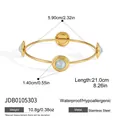 Brazalete minimalista de acero inoxidable dorado con adornos de resina azul claro - Brazalete Circular Acanalado (JDB0105303)