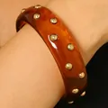 Vintage tortoiseshell resin bangle with gold rivet studs French style fashion accessory - Rivet Style / Brown