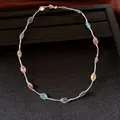 Vibrant dopamine style necklace featuring colorful candy-like beads on a black display tray. - Necklace - Silver - Multicolor