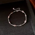Detailed view of a niche design bracelet with colorful mesh-wrapped candy beads. - Bracelet-Brown