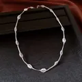 Close-up of minimalist silver chain necklace with delicate mesh bead accents - Necklace-Silver-White