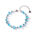 Detailed view of stainless steel bracelet featuring multi-shaped blue zircon stones. - Water Drop and Rectangular Aquamarine Zirconia (Style 3)