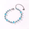 Elegant stainless steel bracelet with faceted aquamarine cubic zirconia and heart charm - Square and Marquise Aquamarine Zirconia (Style 4)
