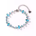 Adjustable stainless steel bracelet with multifaceted aquamarine blue cubic zirconia - Marquise and Round Aquamarine Zirconia (Style 5)