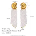 Macro view of 18K gold plated stainless steel stud earrings with elegant pearl tassel drop - Rounded Curved Metal Pearl Tassel Style (E8317) / Gold