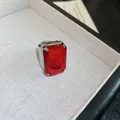 Elegant vintage silver ring featuring a large rectangular red synthetic gemstone - Red