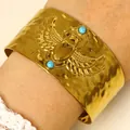 Gold-plated hammered wide stainless steel cuff bracelet with turquoise scarab beetle detail - Scarab Style (K-1578) / Gold