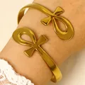 Elegant gold stainless steel arm cuff featuring Egyptian Ankh cross symbols for women - Ankh Symbol Style (5151) / Gold