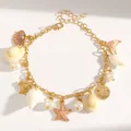 Summer ocean themed charm bracelet featuring starfish, shells, fish tail, and pearls - White Style (DZ-277) / White