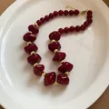 Elegant burgundy acrylic beaded necklace with gold accents for women - Red