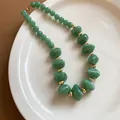 Elegant green acrylic irregular beaded necklace with small gold spacers for women - Green