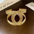 Bracciale rigido dorato di lusso con design a cerchi intrecciati e stile audace unico - Stile Intrecciato a Doppio Anello Incrociato (3#) / Oro