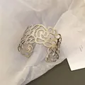 Bracciale rigido a fiori traforati in metallo pesante con elegante design in filigrana - Stile Cavo Floreale a Vite (27#) / Argento