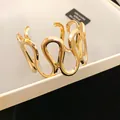 Elegante bracciale rigido a onde in metallo pesante dorato in stile lussuoso ed esagerato - Stile Curva a Onda Irregolare (40#) / Oro
