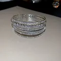 Elegante bracciale rigido multistrato color argento con strass tondi scintillanti - Stile Strass a Sei File Multistrato (55#) / 1 Pezzo / Argento