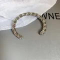 Elegante bracciale rigido a torsione in metallo argentato con finitura intrecciata di lusso - Stile Intrecciato a Torsione (58#) / 1 Pezzo / Argento