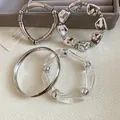 Set di bracciali pesanti color argento con design in acrilico trasparente e metallo - Set di Bracciali in Metallo Argento Multi-design (80#) / Set da 4 pezzi / Argento