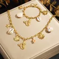 Parure de bijoux en acier inoxydable doré avec breloques sirène et coquillages marin. - N4424 B2201 Ensemble Collier et Bracelet