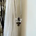 Detailed macro view of the grape-shaped pendant with polished tiger-eye stones and silver petals - Tiger Eye Stone Cluster Necklace