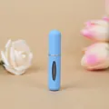 Portable 5ml bottom-fill refillable perfume atomizer spray bottle in matte blue finish - Sea Blue (Sharp Window)