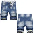 Schmale Herren-Jeans-Shorts mit Distressed-Effekt und gemustertem Futterstoff - EU 38 / Gewaschenes Blau (662#)