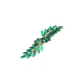Detail view of a golden hair clip featuring sparkling green leaf-shaped rhinestones. - Emerald