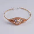 Hand-woven 14K gold filled bangle with a large freshwater pearl and woven detail. - Oval Pink Purple Freshwater Pearl Handmade Woven (NO.26)
