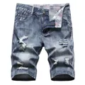Men's stylish summer ripped denim shorts with a distressed loose fit and mid-length cut - 29 / Blue