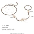 Bracelet esclave en acier inoxydable argenté avec détails en coquillage et perle et tailles - Style Conque Perle (B0891) / Argent