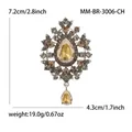 Broche argentée vintage avec pendentif en verre ambré et accents de cristal - Or Café - Champagne