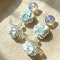 Vintage style light blue rose earrings with iridescent galaxy sphere studs. - 2607018 Gradient Blue Flower Earrings