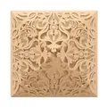 Close-up detail of an intricate laser-cut lace wedding invitation cover in champagne gold - Champagne Gold