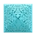 Intricate laser-cut heart and floral lace pattern on a cyan invitation cover - Tiffany Blue