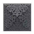 Detailed view of the intricate laser-cut lace pattern on a black invitation cover - Black