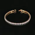 Detailed view of gold plated tennis bracelet with sparkling round white zircons - 2.5mm Rose Gold 19cm