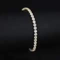 Elegant gold tennis bracelet featuring brilliant round-cut cubic zirconia stones - 2.5mm Yellow Gold 19cm