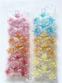 Set di mollette per capelli a fiore di plumeria colorate in confezione trasparente - 11cm Stile a Tre Fiori Trasparente / Set da 12