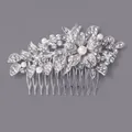 Elegant silver bridal hair comb featuring intricate rhinestone flowers and pearl embellishment - Luxury Rhinestone Bridal Hair Comb