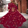 Detailansicht eines böhmischen weinroten Maxikleides mit Blumenmuster und weitem Saum - S / Ancorra Rot