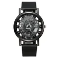 Detail view of men's quartz watch featuring a black skeleton dial and mesh steel strap - Black