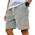 Détail en gros plan d'un short en velours côtelé gris pour homme avec cordon de serrage - M / Bas / Gris
