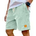Détail de short en velours côtelé vert menthe pour homme avec cordon de serrage et texture. - M / Bas / Vert clair