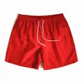 Quick-dry red polyester beach swimming shorts for men featuring a white drawstring - M / Red