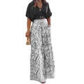 Ensemble d'été élégant avec haut noir à col en V et pantalon large à imprimé floral. - Noir